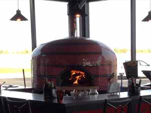 Tiled commercial oven showing fire